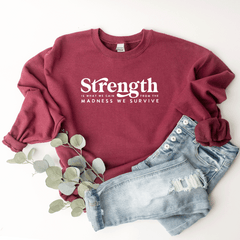 Strength Is What We Gain From The Madness We Survive - Sweatshirt